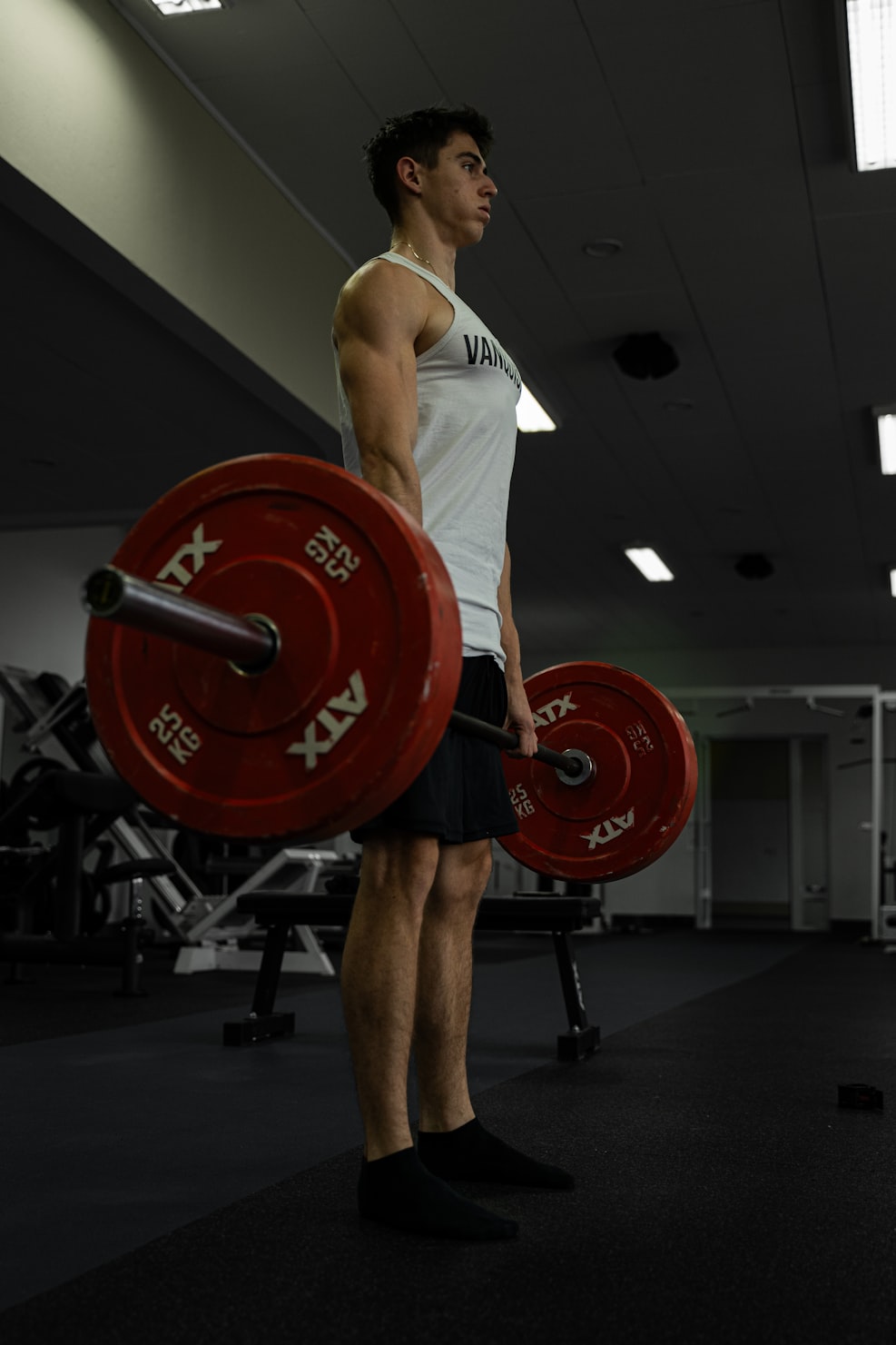 Person performing deadlift exercise with AI form analysis